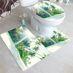 Detailed top view of 3-piece bathroom mat set featuring tropical beach and coconut palm design