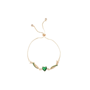 Elegant gold adjustable bracelet with green heart stone and sparkling wing-shaped charms