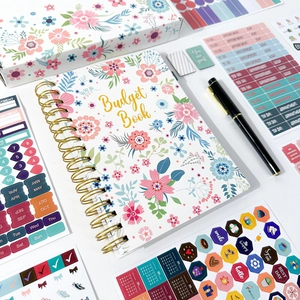 Floral budget book planner set with spiral binding, monthly stickers and a black pen
