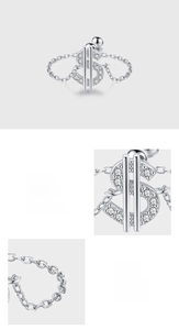 Detailed close-up of 925 sterling silver dollar sign jewelry with 5A grade pavé zircons