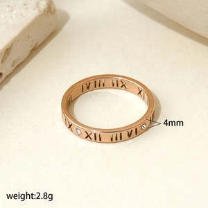 Detail of 4mm rose gold tree of life ring with Roman numerals and small diamonds