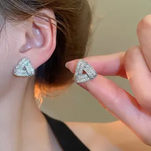 Silver triangle stud earrings with crossover zircon weave design for women