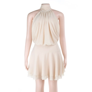 Detail of beige chiffon halter neck dress featuring pleated chest and layered wavy hemline