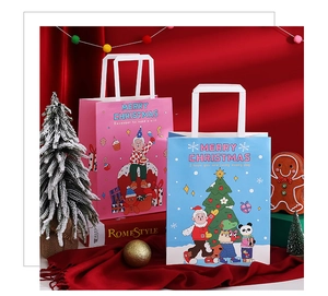 Detail of blue and pink Christmas gift bags with cartoon Santa and reindeer illustrations