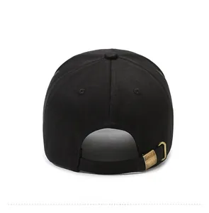 Rear view of black baseball cap showing vintage copper buckle and adjustable strap detail