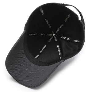 Inside view of corduroy baseball cap with adjustable strap and reinforced lining