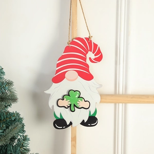 Wooden St. Patrick's Day gnome ornament with red striped hat and green clover charm