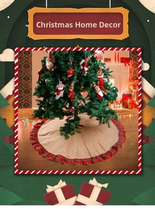 Close-up of burlap Christmas tree skirt with red and green plaid ruffled edges