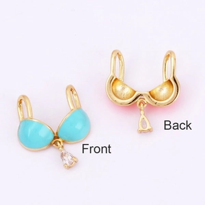 Front and back detail of blue enamel brass bra pendant with clear teardrop zircon