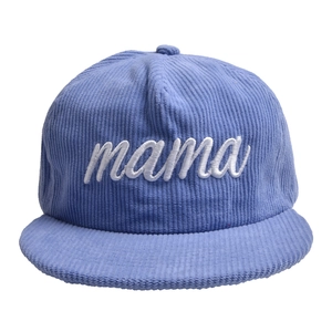 Close-up of white embroidered mama script on light blue corduroy flat brim baseball cap