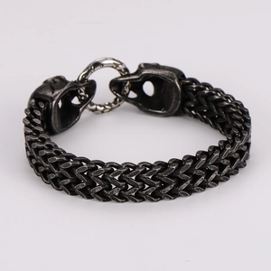 Bracciale da uomo in acciaio inox con teschio e doppia catena in finitura argento