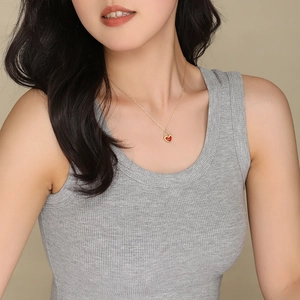 Elegant S925 sterling silver gold chain necklace with a vibrant red heart pendant