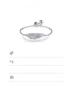 Macro detail of S925 sterling silver feather ring with cubic zirconia inlay and dimensions