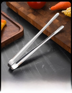 Close-up of SUS 304 stainless steel food tongs with serrated tips and U-shaped design