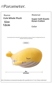 Detail view of the yellow whale plush keychain showing its 12cm size and soft embroidery