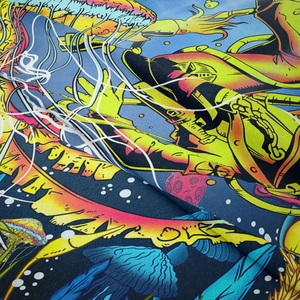 Close-up of deep sea diver and jellyfish pattern on polyester astronaut tapestry