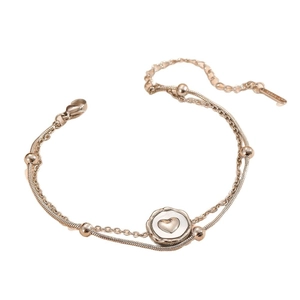 Rose gold stainless steel double chain bracelet with heart shell pendant in white background