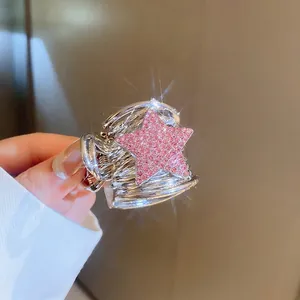 Y2K silver star hair claw clip with pink rhinestones for high ponytail styles