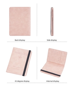Pink RFID passport holder interior layout showing card slots and elastic strap detail