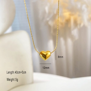 Macro shot of 12mm gold heart pendant with dimensions and detailed 45cm chain specs