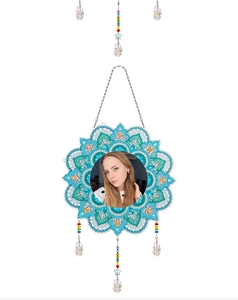 Detailed view of DIY mandala diamond painting mirror with hanging crystal charms