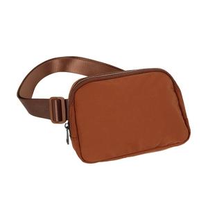 Detailed side view of caramel brown waterproof nylon belt bag with adjustable strap