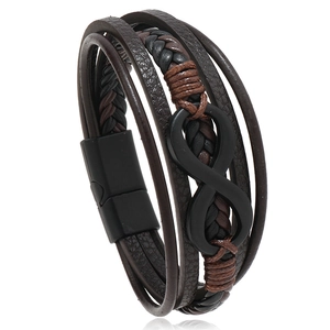 Detail of multi-layer leather bracelet with infinity symbol and black magnetic clasp