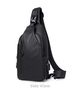 Detail view of the black men's waterproof sling chest bag featuring USB charging port.