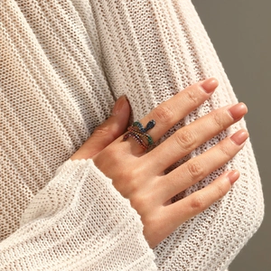 S925 sterling silver snake ring with colorful zircon pavé stones worn by a model