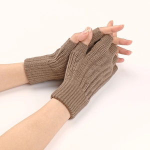 Detailed view of brown cable knit fingerless gloves with soft texture for winter warmth