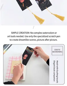 Detail of Chinese style scratch art bookmark with gold tassel and mountain scenery patterns