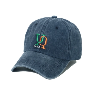 Distressed navy blue washed cotton baseball cap with embroidered UQ 1983 logo