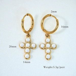Detail view of gold hoop earrings with pearl-set cross pendant and size specifications