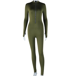 Close-up of army green slim fit jumpsuit featuring a functional front zipper and stand collar