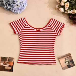 Detail view of red and white striped ribbed knit crop top featuring a delicate ribbon bow