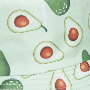 Detailed macro view of green twill cotton fabric with realistic avocado print pattern