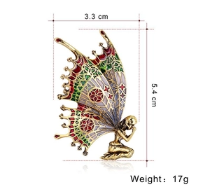 Detailed view of vintage butterfly angel brooch with enamel wings and size dimensions