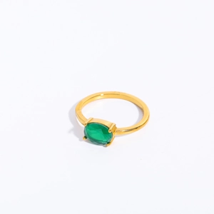 Minimalist gold stainless steel ring featuring a single oval green birthstone in a 4-prong setting