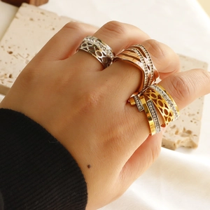 Minimalist 18K gold plated titanium rings with laser cut rhinestones on woman hand