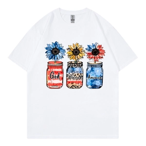 White oversized t-shirt with patriotic God Bless America graphic and sunflower print