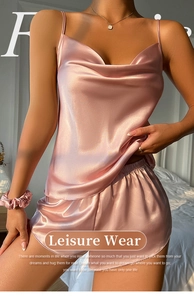 Detail of pink ice silk satin sleepwear set with cowl neck top and matching hair scrunchie