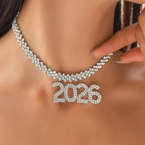 Close-up of 2026 numeric pendant sweater chain with sparkling rhinestones on model