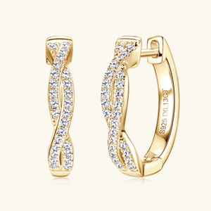 Close-up of S925 sterling silver golden twisted hoop earrings with 0.13CT diamond detail
