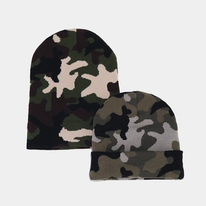 Knit beanie hats in woodland and urban camouflage patterns for winter warmth