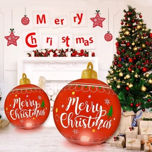 Detail of red inflatable Christmas ball with LED lights and Merry Christmas typography