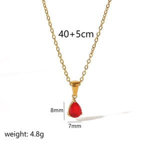 Detail view of red teardrop gemstone pendant with 40+5cm gold stainless steel chain