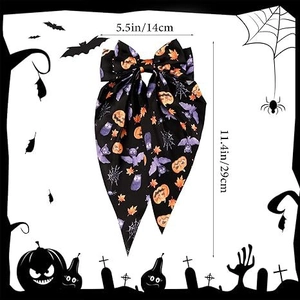 Halloween oversized bow hair clip with orange pumpkins and purple bats print on black ribbons