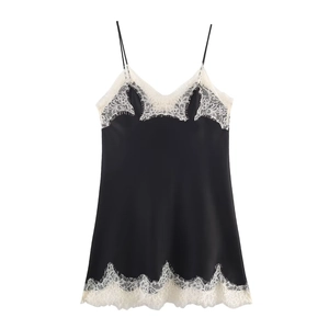 Elegant black satin camisole top with creamy lace trim and delicate spaghetti straps