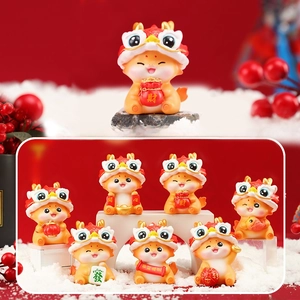 Close-up of Tang dynasty style dragon figurines with traditional lion dance hats
