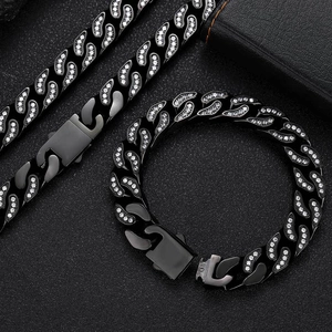 Detail view of 12mm black stainless steel Cuban chain necklace and bracelet with clear zircons